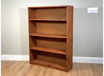 A Basic Wood Bookcase With Adjustable Shelves