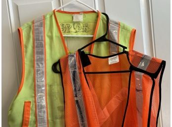 A Pair Of Reflective Vests