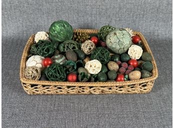 A Pretty Woven Basket Full Of Holiday Filler: Orbs, Berries, Pinecones & More