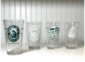 Four Branded Pint Glasses