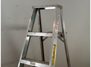 An Aluminum Ladder By Keller, 6'