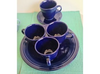 4 Cobalt Blue Cup And Saucers And 1 Dinner Plate , Not Sure  If These Are Fiesta. No Markings.