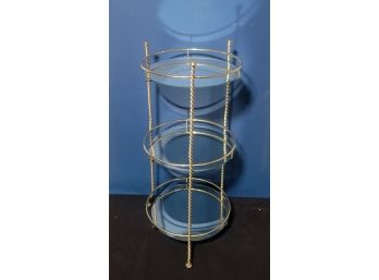 Metal  3 Tiered Table With Twisted Vine Legs .  Finished In Gold. - - - - - - - - - -- - - - - - - Loc: Garage