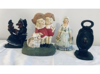 Group Of Four Vintage Painted Cast Iron Door Stops