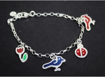 Fine Sterling Silver Charm Bracelet Having Enamel Charms Made In Mexico