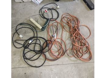 Working Lot Of Six Extension Cords, Long And Short Ones In Orange, Black, Green & White Colors.