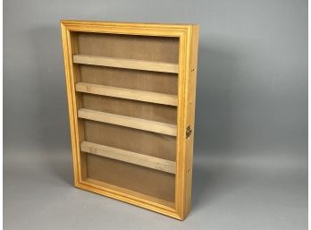 A Wooden Display Shelf Case