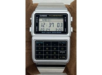 Never Worn Men's CASIO DATA BANK CALCULATOR WATCH