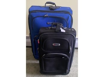Two Delsey Luggage Bags