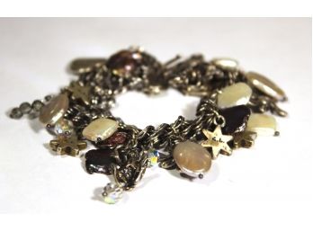 Fine Signed Chan Luu Sterling Silver Charm Bracelet Having Cultured Pearls