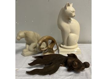 Four Animals In Wood, Porcelain, And Chalk