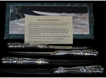 WM ROGERS - 4 Piece Steak Silver Plated Knife Set  (VALUED $100+)
