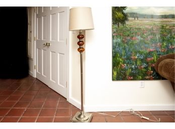 Floor Lamp With Amber Glass And Tan Shade