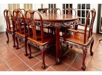Carved Rosewood Dining Table And Eight Chairs