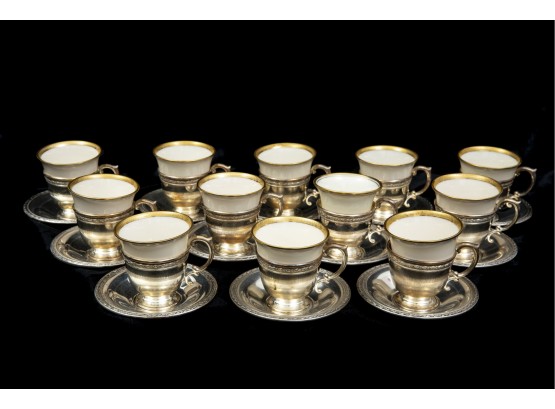Set Of Twelve Lenox Porcelain Demitasse Cups With Sterling Cup Holders And Saucers (Total Weight 24.19 Troy Ou.)