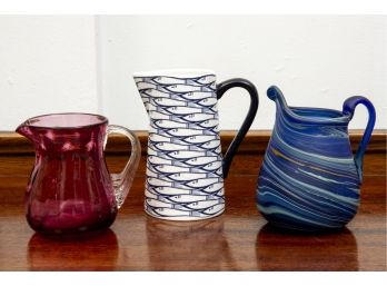 Hand Blown Glass And Jersey Pottery Pitchers