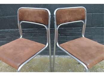 Wonderfully Fluid Italian Chrome Chairs. QUE BELLA!!!
