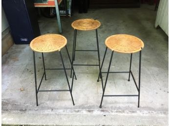 Three Stackable Iron And Wicker Seat Stools