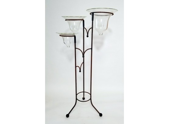 Three Tiered Metal Rack With Glass Vessels