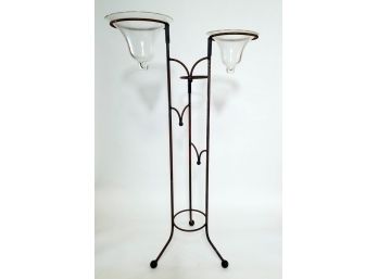 Two Tiered Metal Rack With Glass Vessels