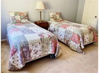 Pair Of Twin Beds With Quilts