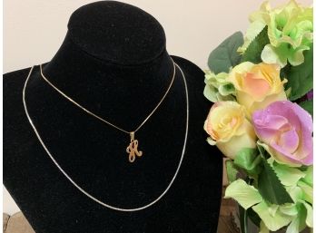 14k Gold Necklace With Charm And Sterling Silver Necklace