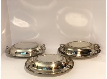 Three Covered Silver Serving Trays