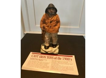 Cast Iron Reproduction 1900 Man With Raincoat