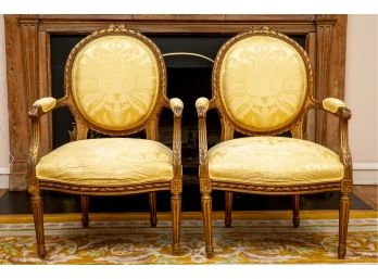 Pair Of French Oval-Back Bergère Chairs With Delicately Carved Floral Motifs
