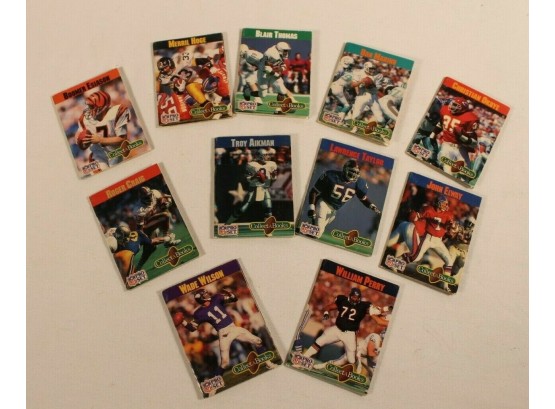 Lot Of 11 Football Collect A Books With Troy Aikman, Boomer Esiason, Dan Marino, John Elway, Lawrence Taylor