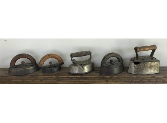 Five Sad Irons With Wooden Handles