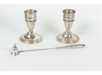 Pair Of Cartier Weighted Sterling Silver Candlesticks