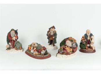 Collection Of June McKenna Santa Figurines