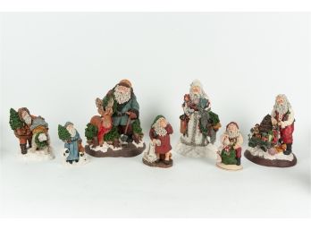 Collection Of June McKenna Santa Figurines
