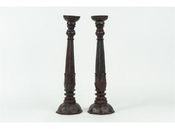 Pair Of Carved Ebonized Wood Candelsticks