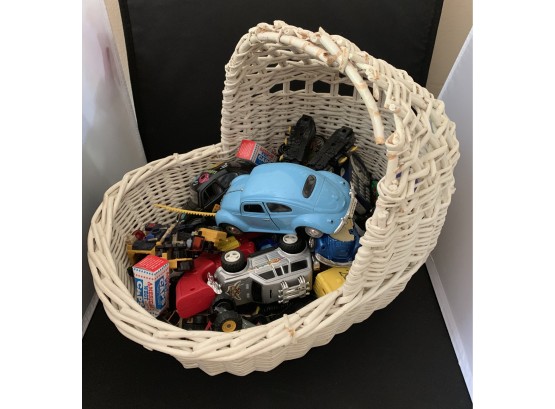 Basket Filled With Cars And Miscellaneous Toys