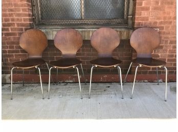 Brown And Chrome Stackable Chairs