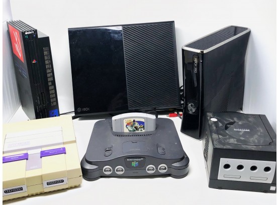 XBOX And Nintendo Play Station Gaming Systems With Game Cartridges And Controls