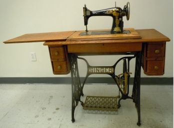 Antique Singer Sewing Machine In 4-Drawer Cabinet