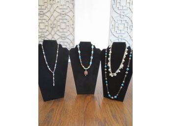 Group Of 4 Silver And Blue Tone Fashion Necklaces
