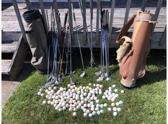 Golf Lot Including 2 Bags, 2 Sets Of Clubs, And 100  Balls