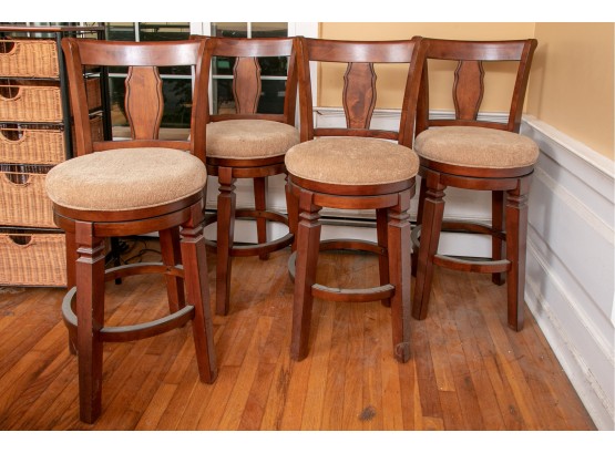 A Set Of Four Contemporary Solid Cherry Bar Stools