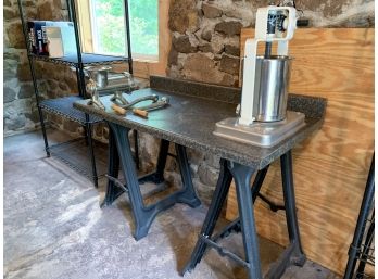 A Homemade Bench With Attached Meat Grinder And Sausage Maker