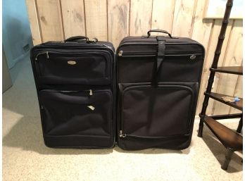 2 American Tourister  Suitcases