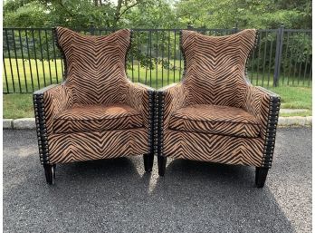 Pair Of Brown Zebra Print Upholstered Wingback Chairs With Leather Trim