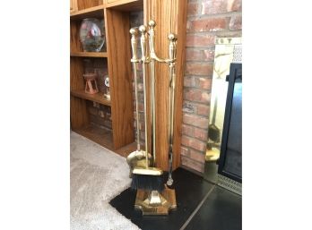 Gleaming Brass Fireplace Tools