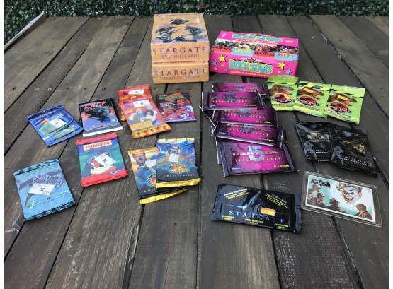 Assortment Of Collectible Card Packs And Boxes