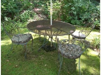 Quality Wrought Iron Table &  4 Chairs W/ Umbrella  & Two Chaise Lounges NICE LOT !