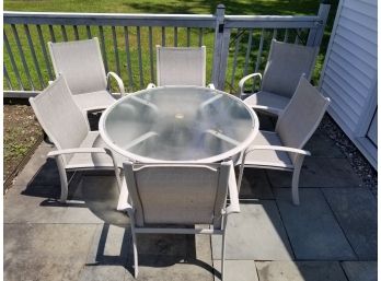 Outdoor Patio Glass Top Table With 6 Chairs And A Red Marble Base Stand