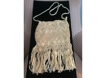 Crocheted Fringed Drawstring Shoulder Purse In Off-White